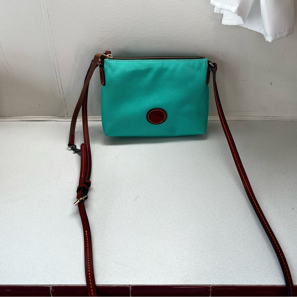 Dooney and Bourke teal fabric/leather crossbody